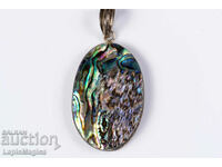 Iridescent mother-of-pearl pendant 69.7ct oval
