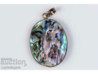 Iridescent mother-of-pearl pendant 57.6ct oval