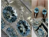 Delicate silver earrings with blue topaz