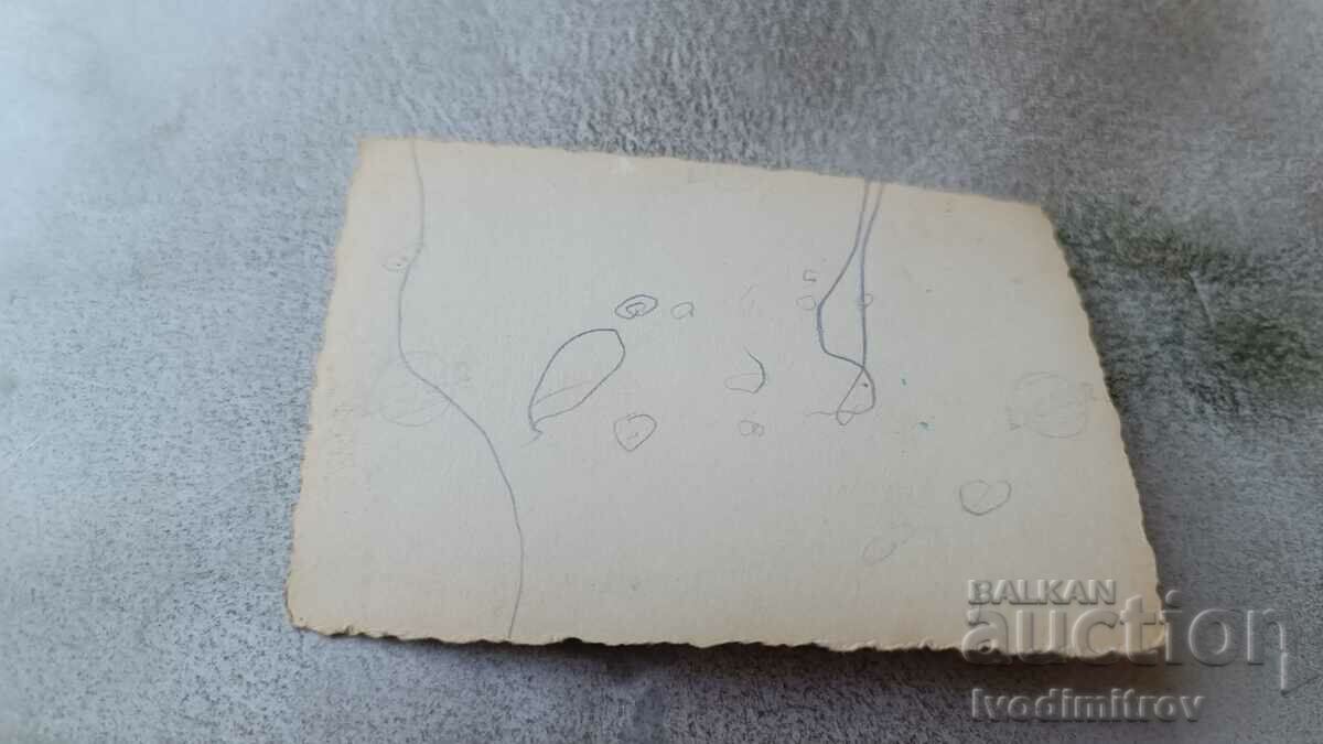 Picture Five men in swimsuits lying on a beach by the river with price 2.65 BGN | € 1.35 Picture Five men in swimsuits lying on a beach by the river with price 2.65 BGN | € 1.35