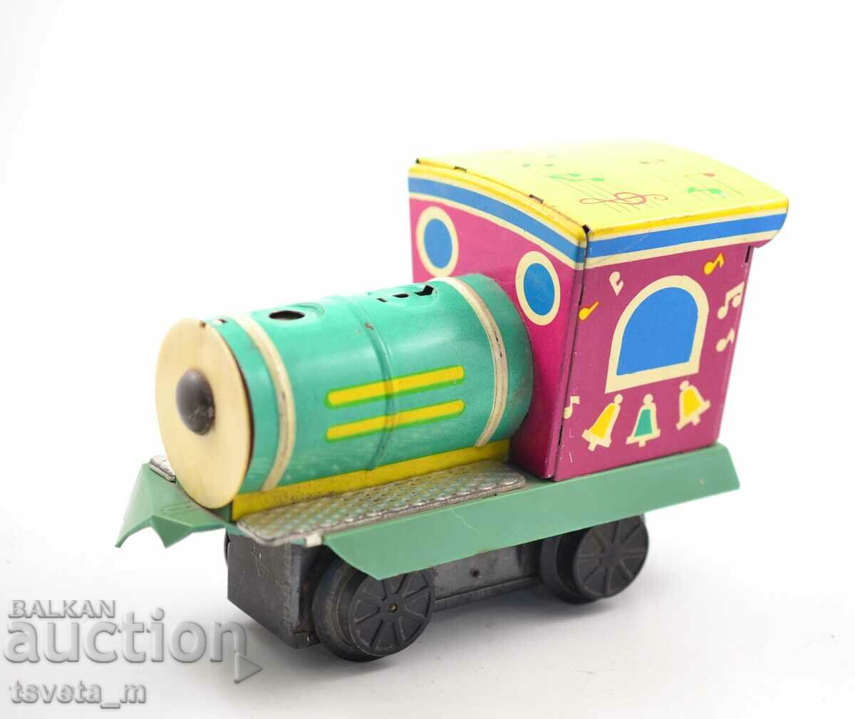 Mechanical tin toy locomotive USSR, soc with price 10.00 BGN | € 5.11 Mechanical tin toy locomotive USSR, soc with price 10.00 BGN | € 5.11
