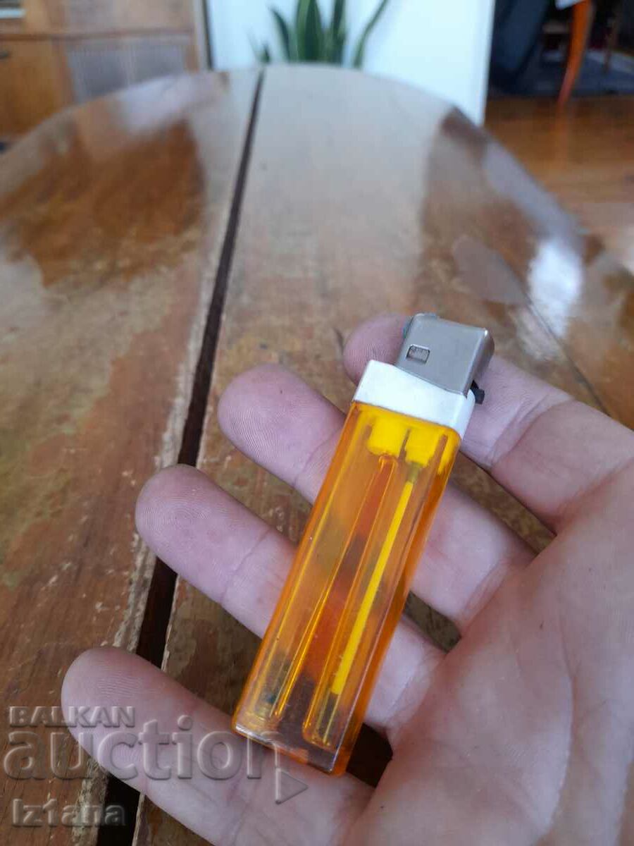 Auction  Old Tomic lighter