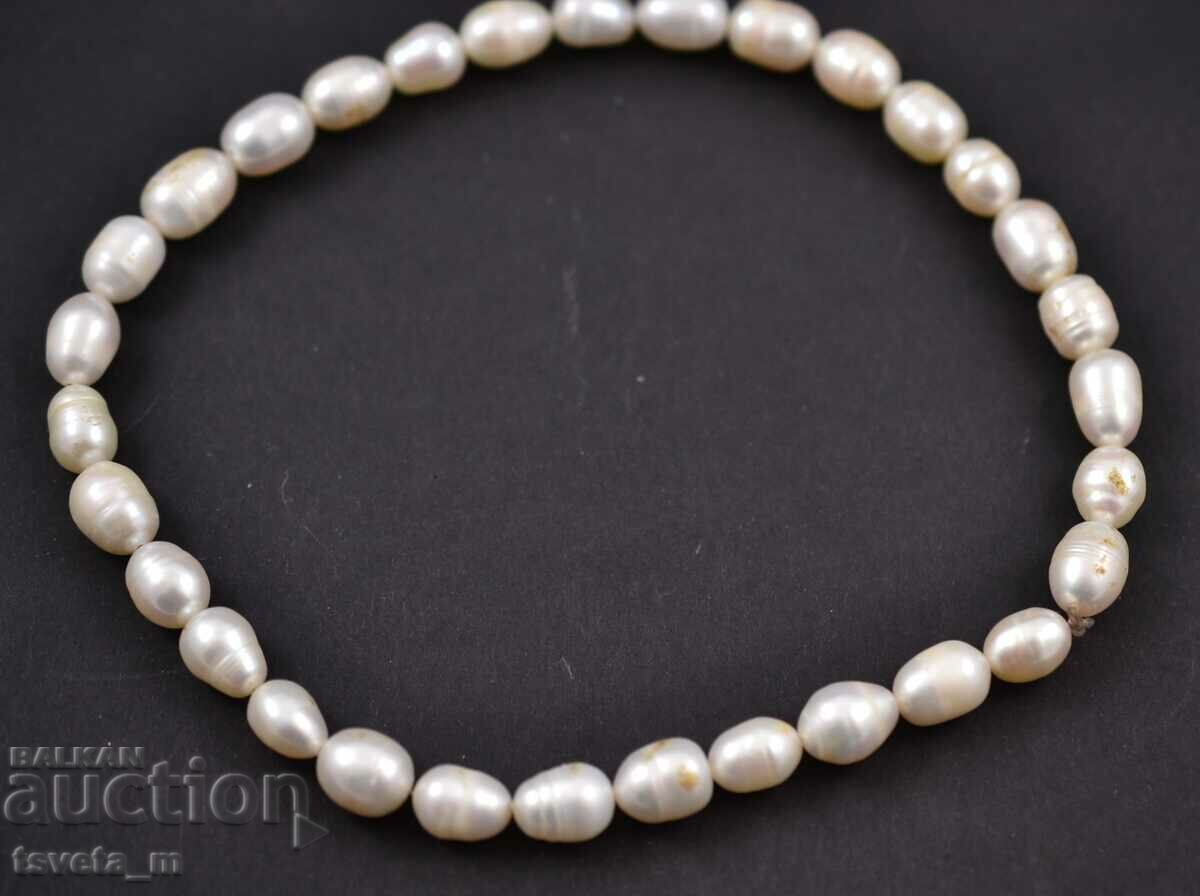 A string of pearls with price 12.00 BGN | € 6.14 A string of pearls with price 12.00 BGN | € 6.14