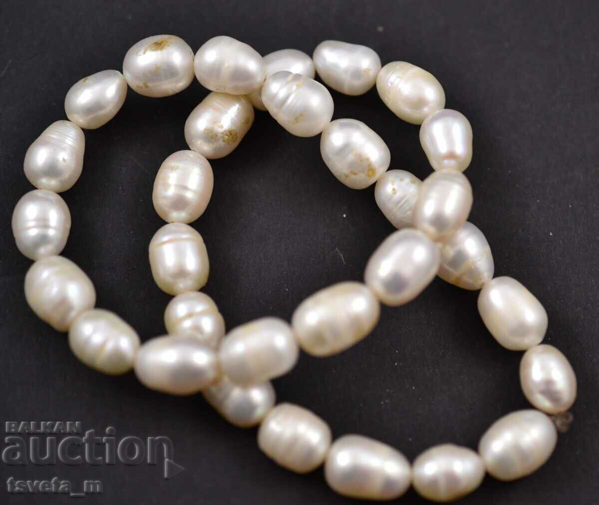 Auction A string of pearls Auction A string of pearls