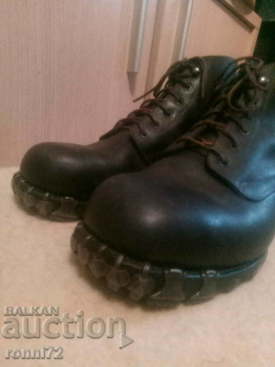 Auction  Mountain military boots.