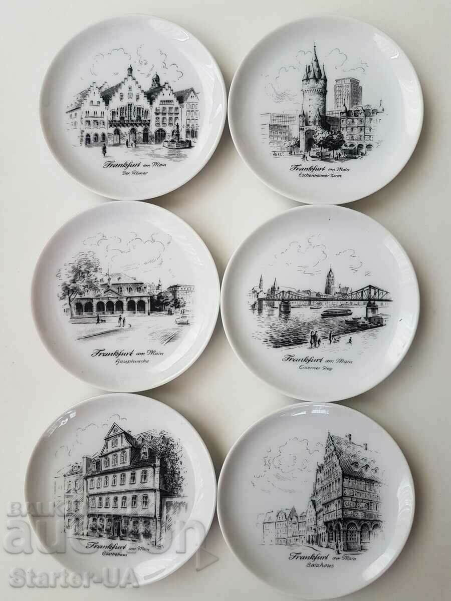 Porcelain saucers with architectural buildings