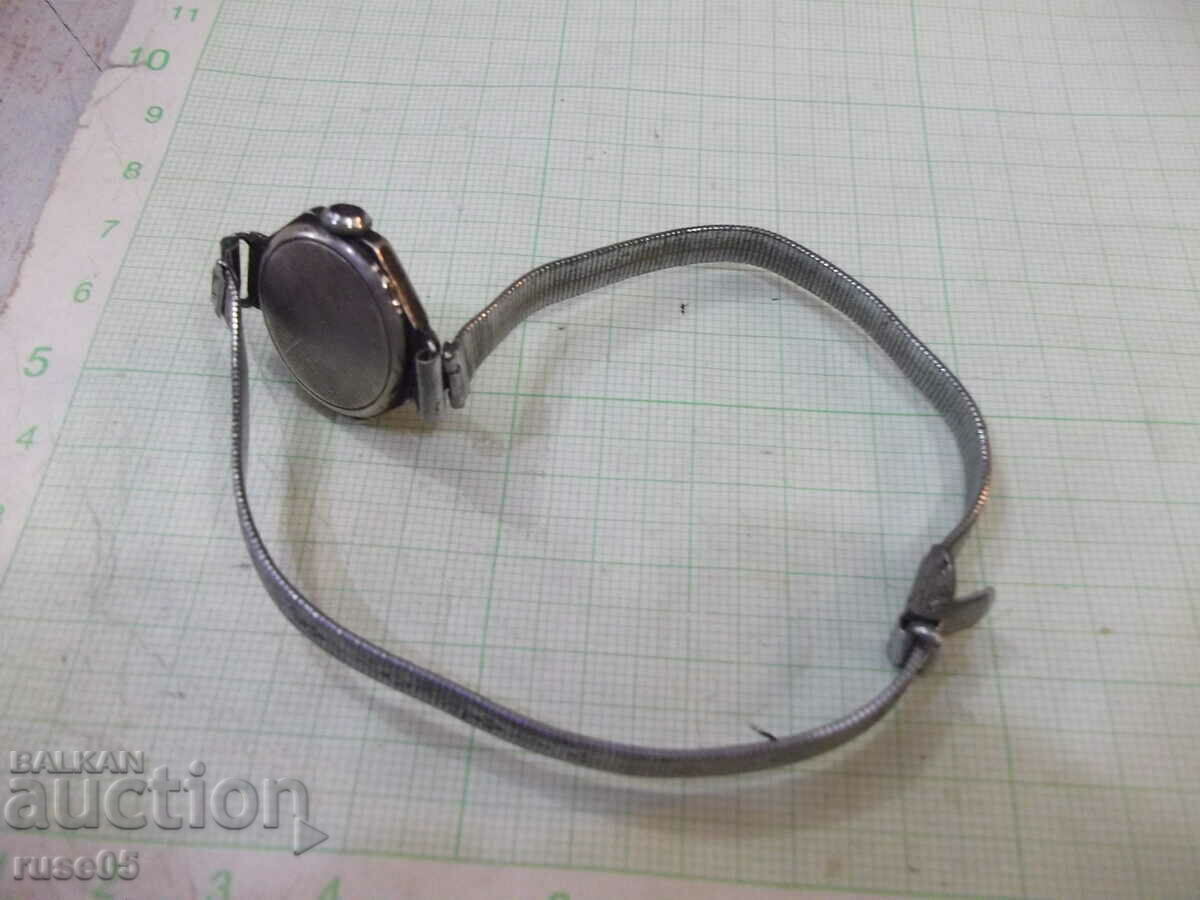 Auction  Old manual working women's watch with silver case