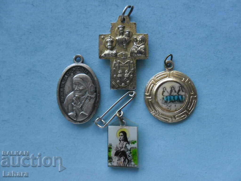 Lot of religious themed pendants and cross