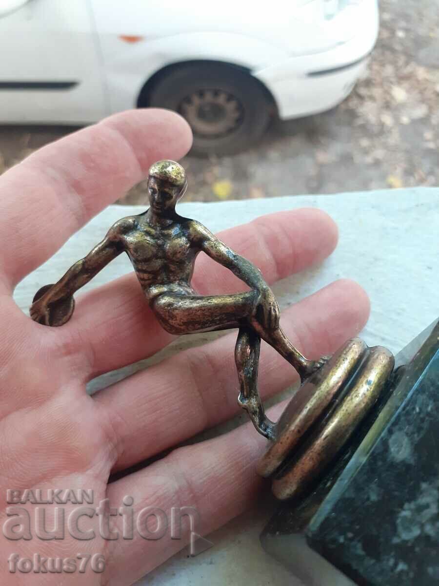 A small metal figurine of a discus thrower - 5 A small metal figurine of a discus thrower - 5