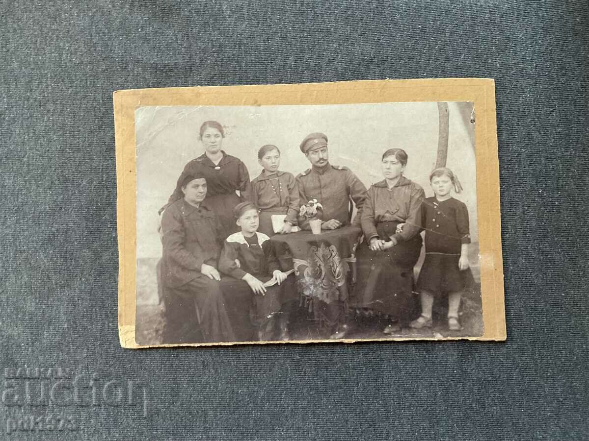 Old photo cardboard soldier with his family 1910