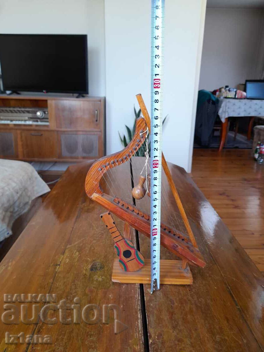 Delivery of Old wooden musical souvenir, decoration Delivery of Old wooden musical souvenir, decoration