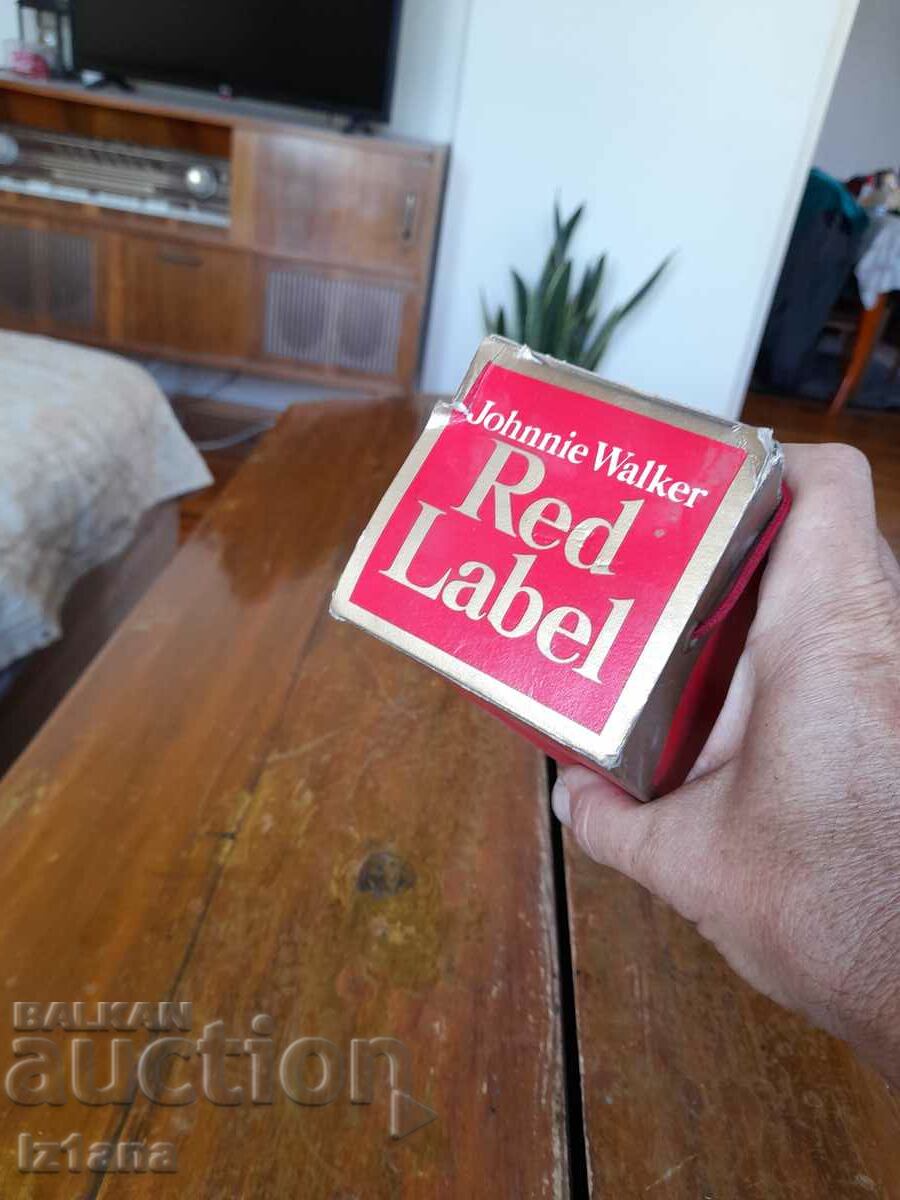 Auction An old bottle of Johnnie Walker Auction An old bottle of Johnnie Walker