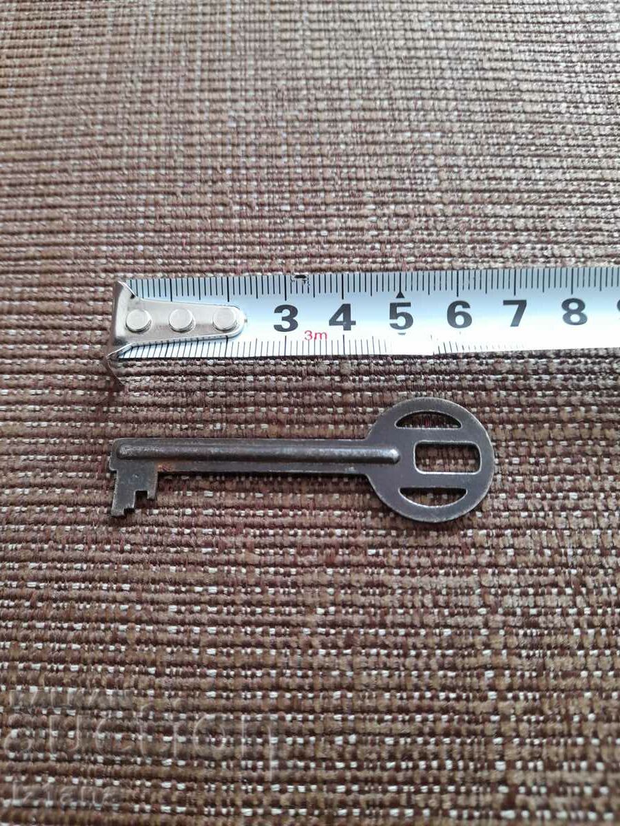 Old metal key with price 11.00 BGN | € 5.62 Old metal key with price 11.00 BGN | € 5.62