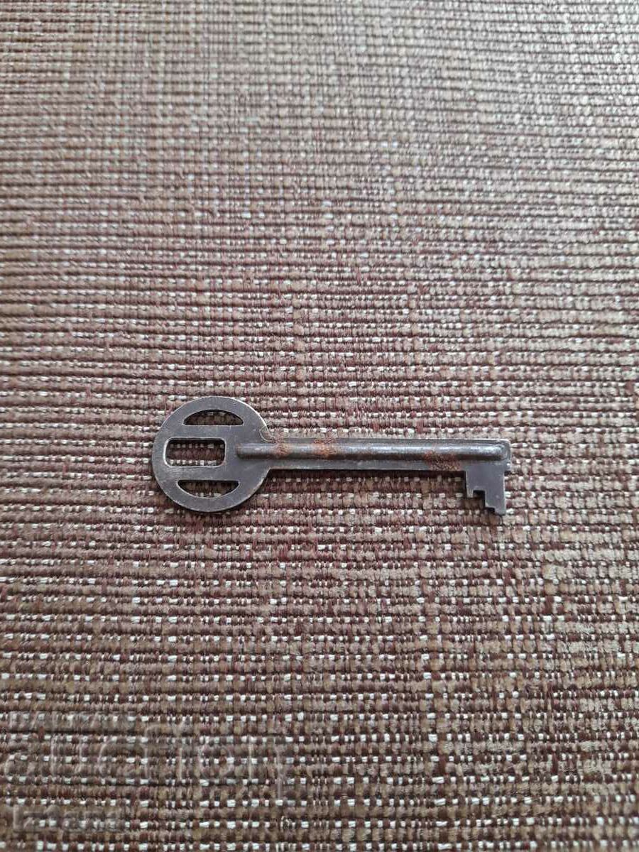 Auction Old metal key Auction Old metal key