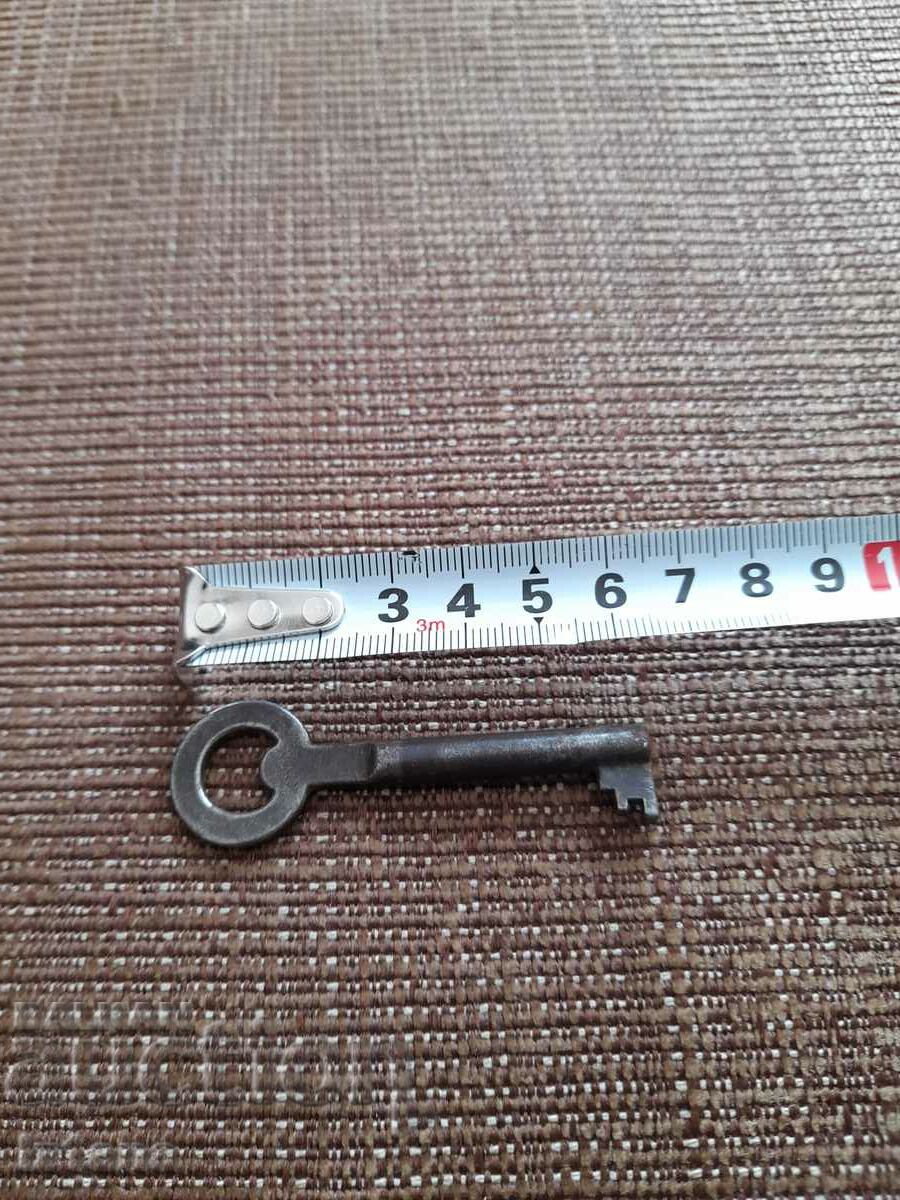 Old metal key with price 11.00 BGN | € 5.62 Old metal key with price 11.00 BGN | € 5.62
