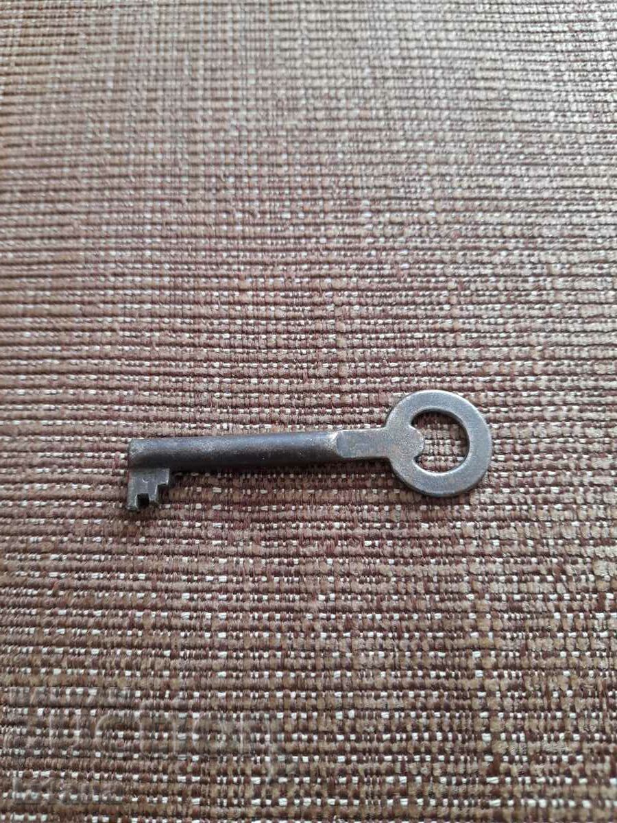 Auction Old metal key Auction Old metal key