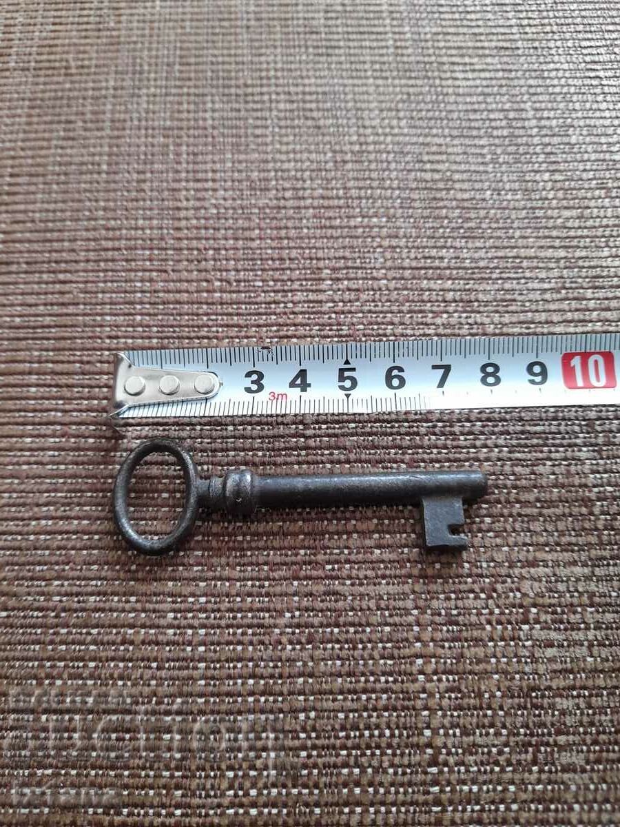Old metal key with price 11.00 BGN | € 5.62 Old metal key with price 11.00 BGN | € 5.62