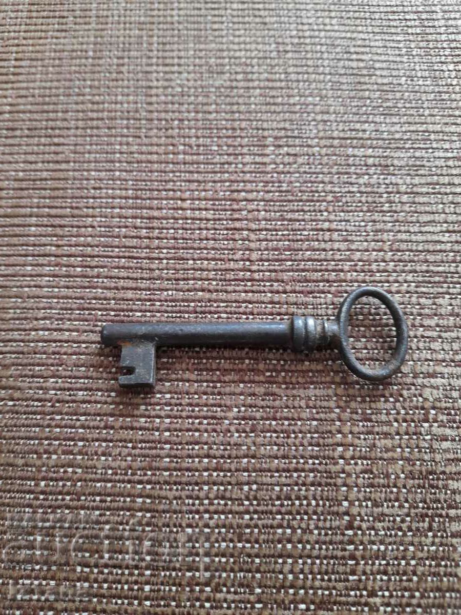 Auction Old metal key Auction Old metal key