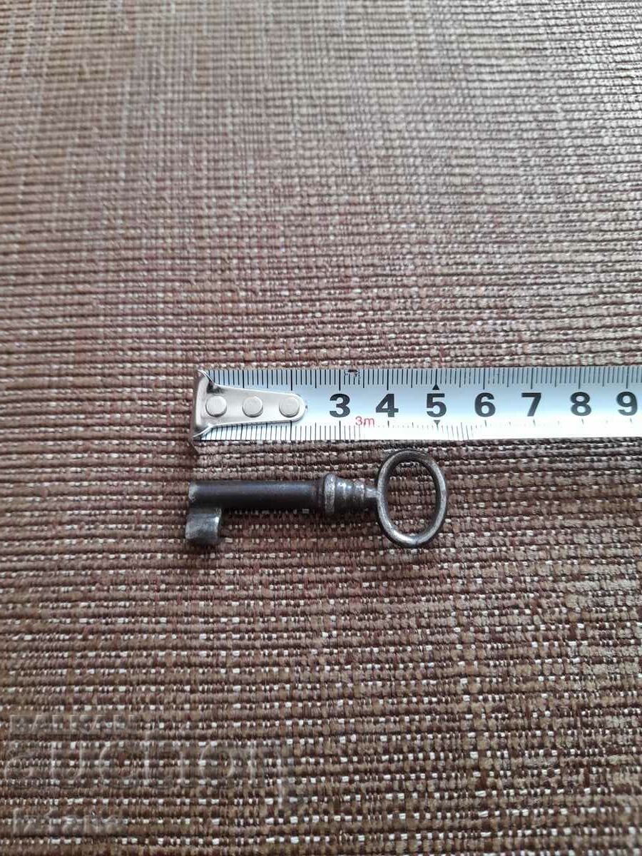 Old metal key with price 11.00 BGN | € 5.62 Old metal key with price 11.00 BGN | € 5.62