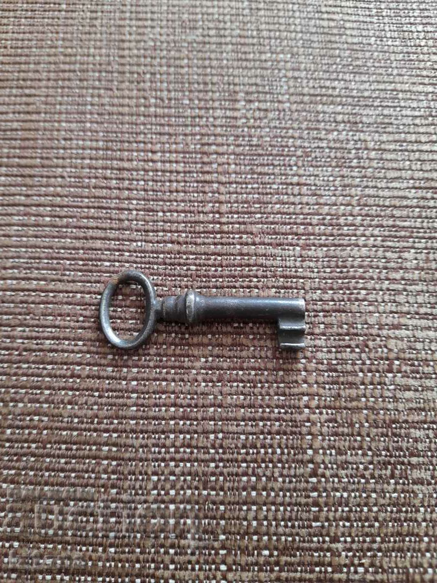 Auction Old metal key Auction Old metal key