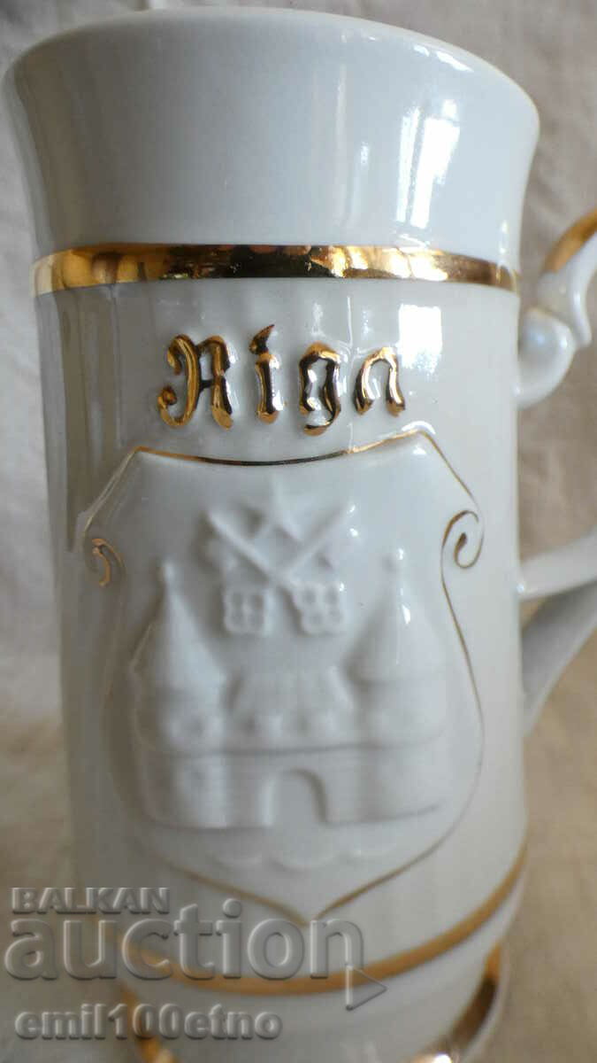 Mug souvenir with the coat of arms of Riga and many gilt porcelain USSR with price 12.00 BGN | € 6.14 Mug souvenir with the coat of arms of Riga and many gilt porcelain USSR with price 12.00 BGN | € 6.14