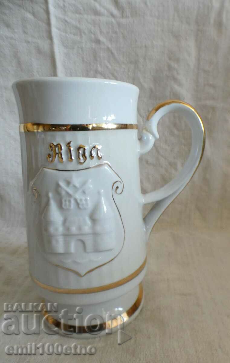 Mug souvenir with the coat of arms of Riga and many gilt porcelain USSR
