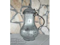 Old wrought copper jug