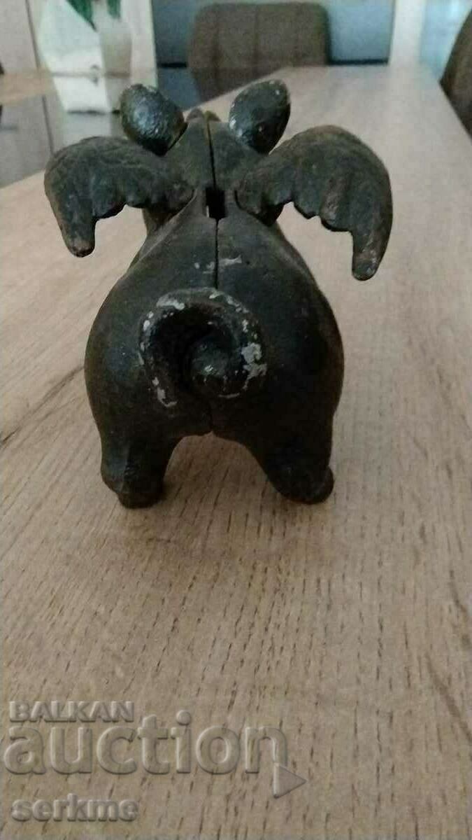 Auction Vintage cast iron pig with wings, piggy bank Auction Vintage cast iron pig with wings, piggy bank