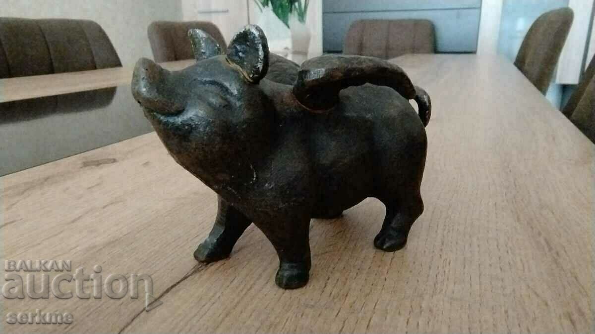 Vintage cast iron pig with wings, piggy bank