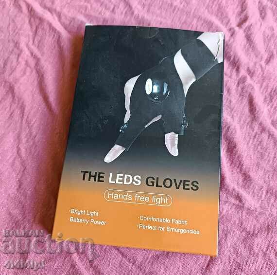 Gloves with flashlights