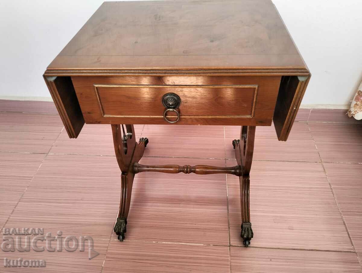 A solid wooden table or bedside table