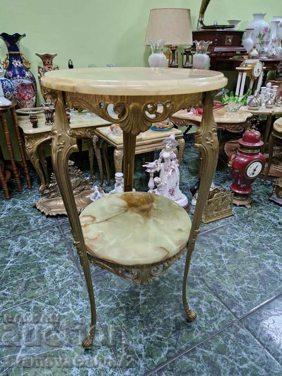 A wonderful antique high bronze table