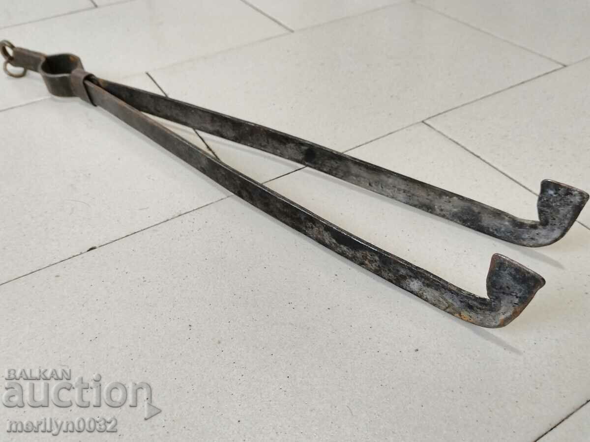 Old dilaf, tongs, wrought iron for oven
