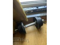 A dumbbell just under 10 kilograms