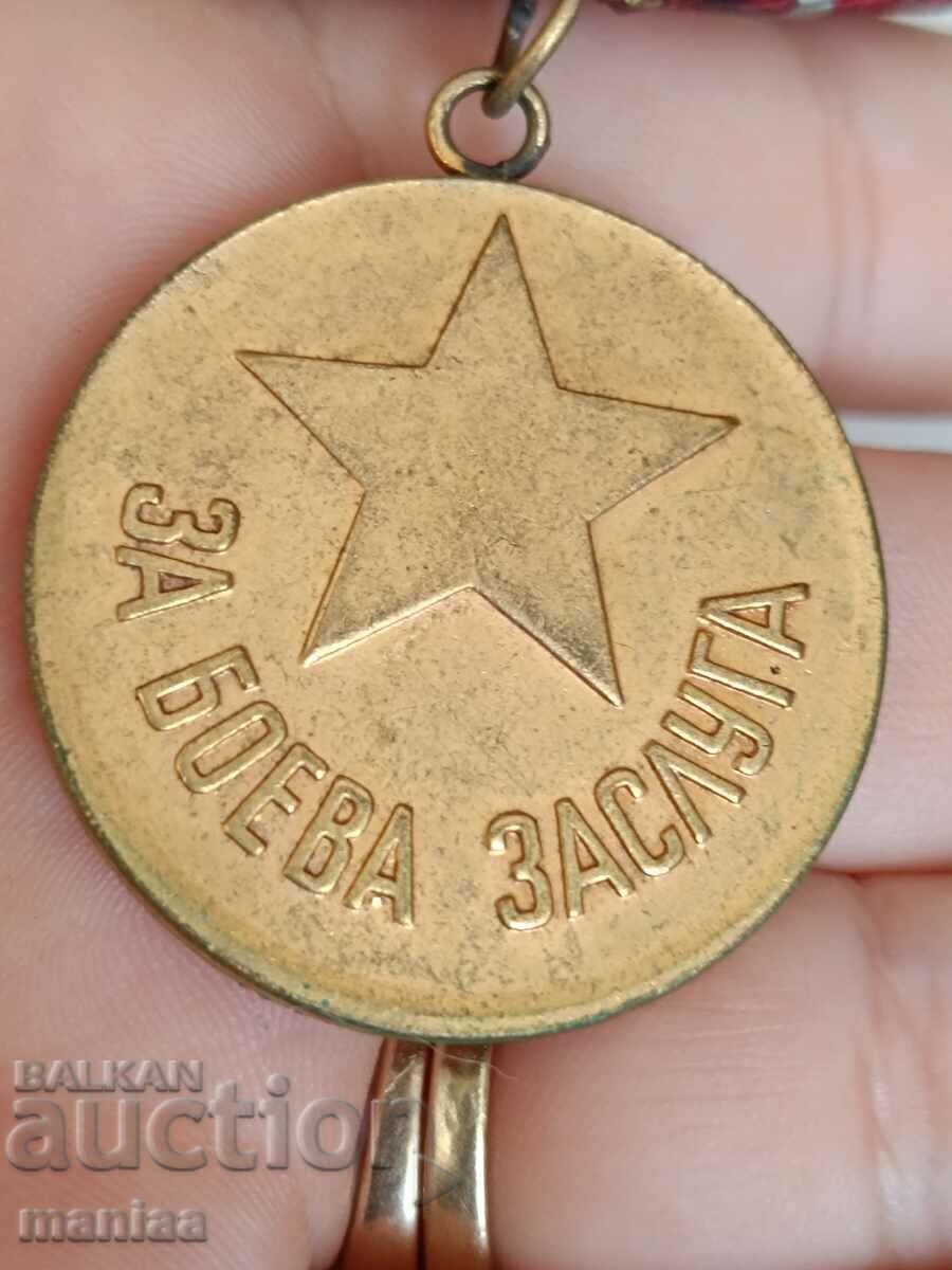 Delivery of Medal for Combat Merit