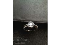 Silver ring with zircons