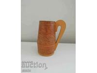 Wooden cup with ornaments, mug