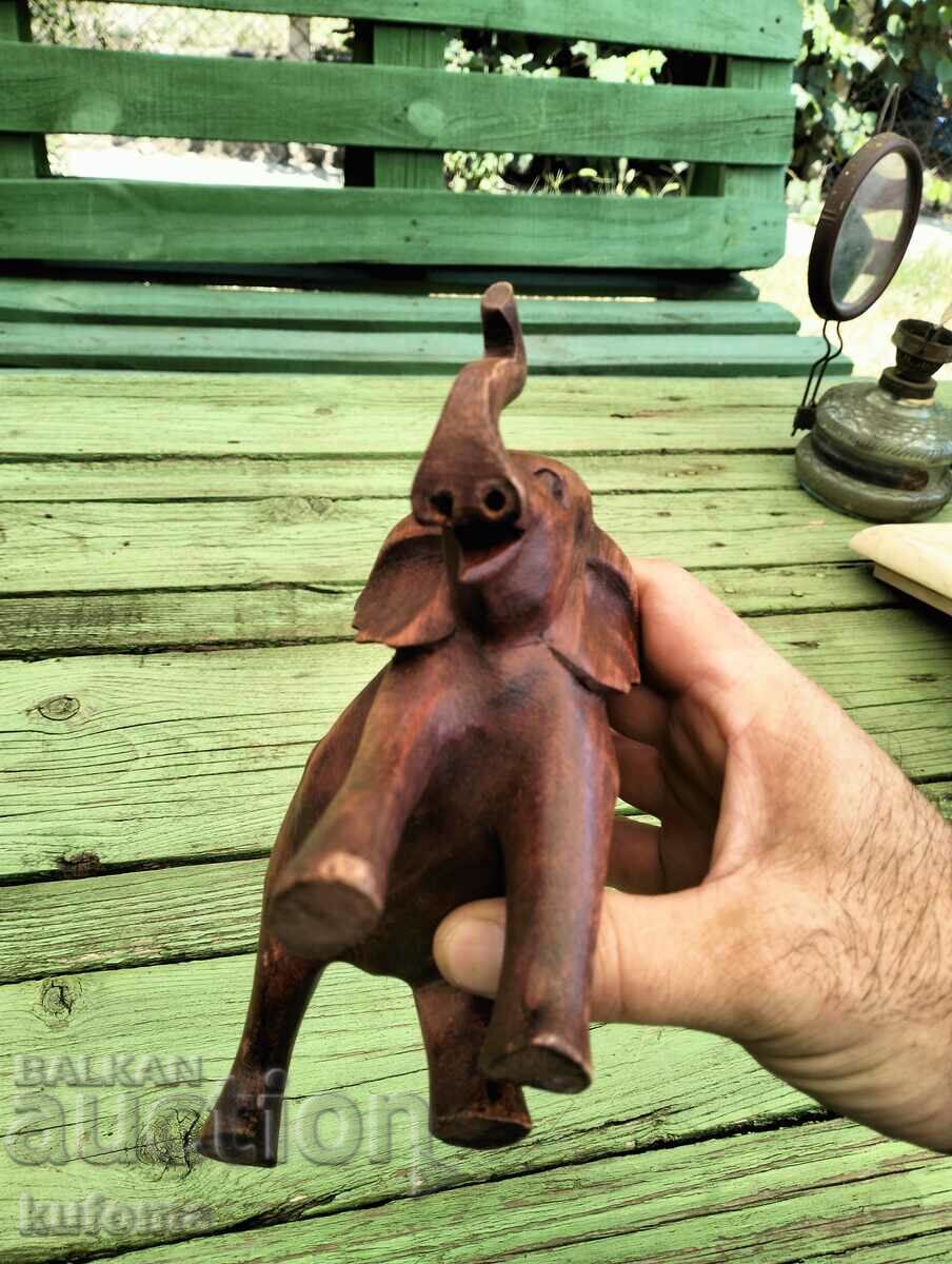 Auction A wooden elephant Auction A wooden elephant