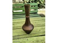 A copper vase or jug