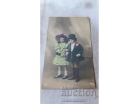 Little girl and little boy postcard 1912