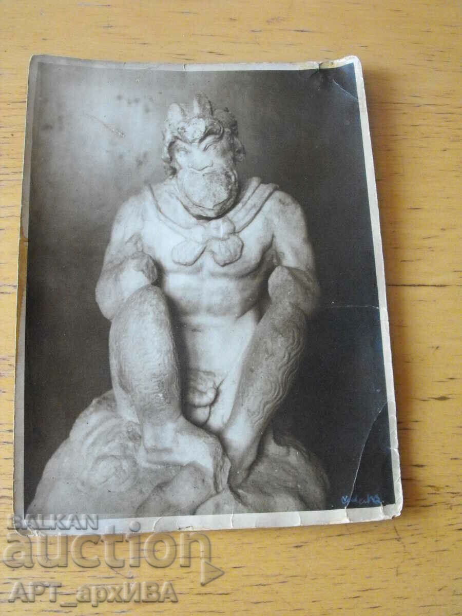 Photo - statue of a satyr.