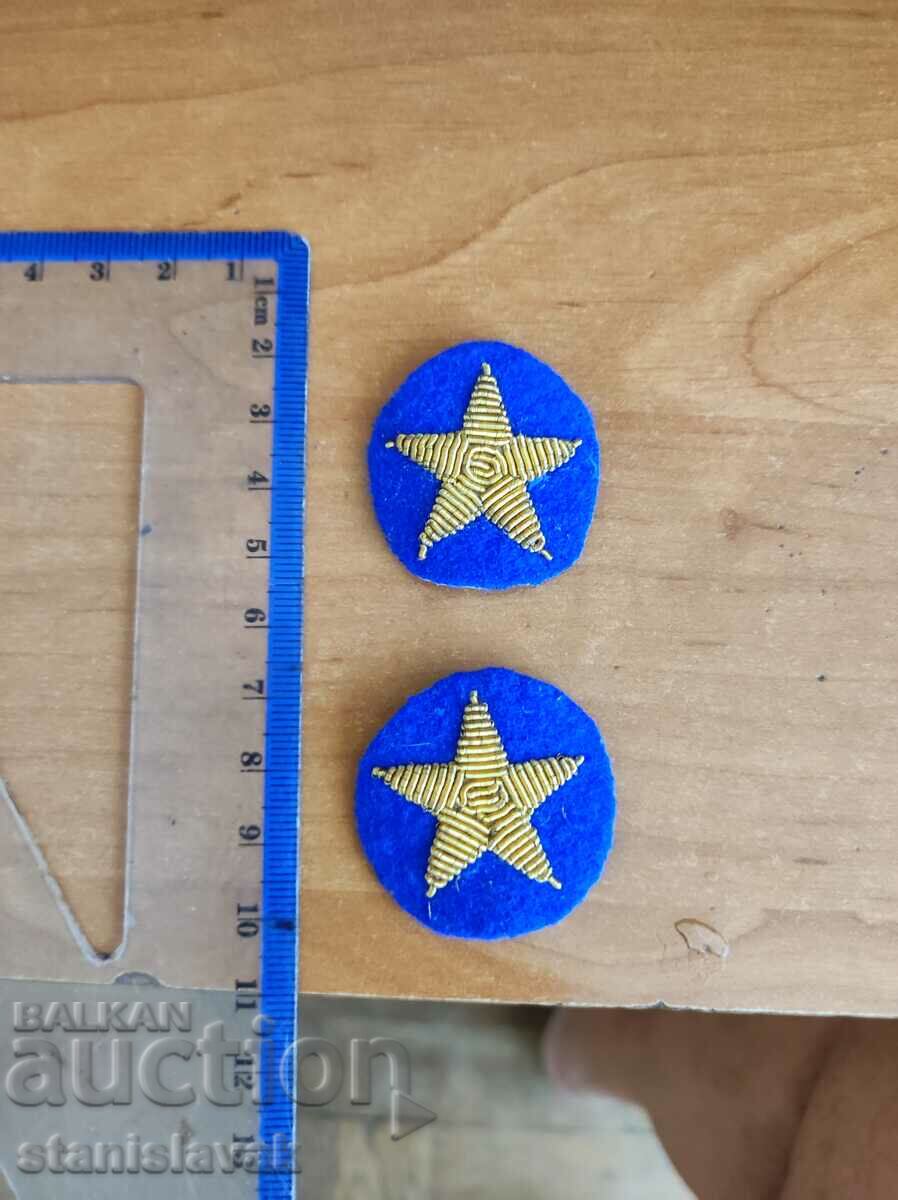 Auction  Silver stars on blue cloth