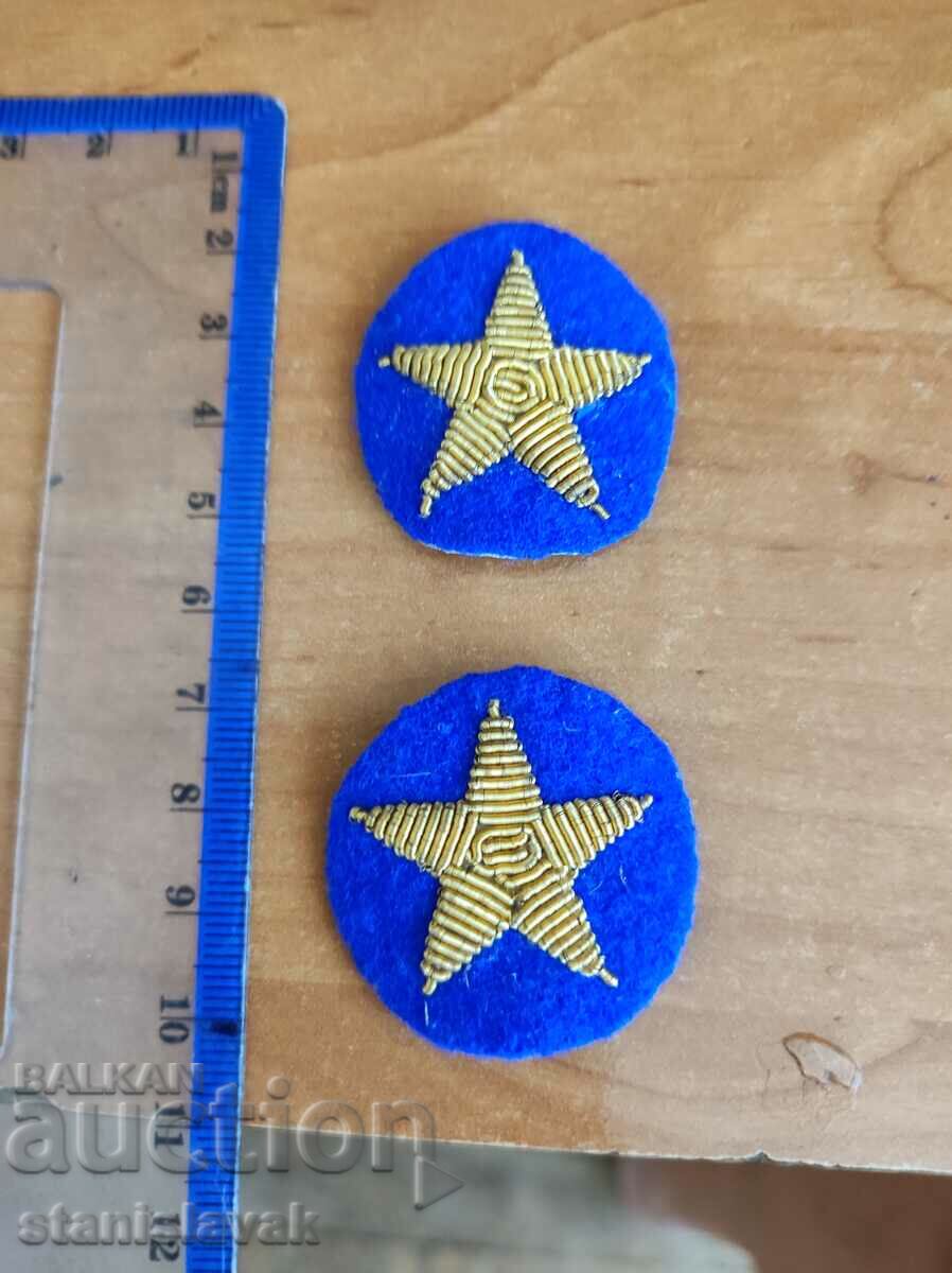 Silver stars on blue cloth