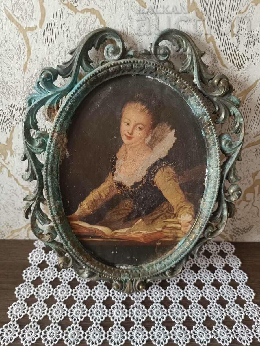 Antique Lady in metal bronze frame from the late 19th century