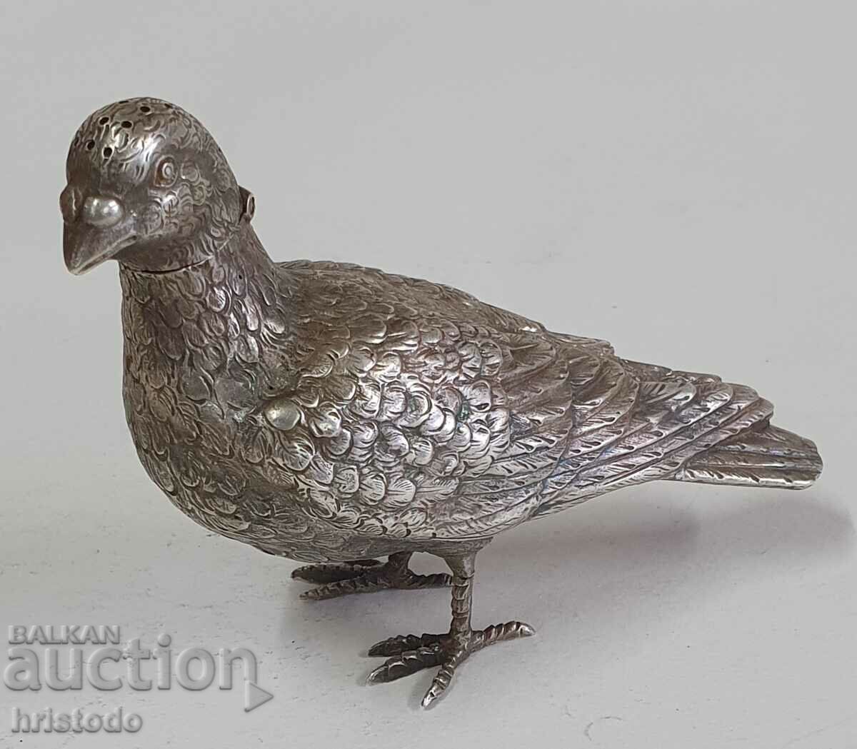 Old silver salt shaker pigeon