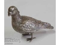 Old silver salt shaker pigeon