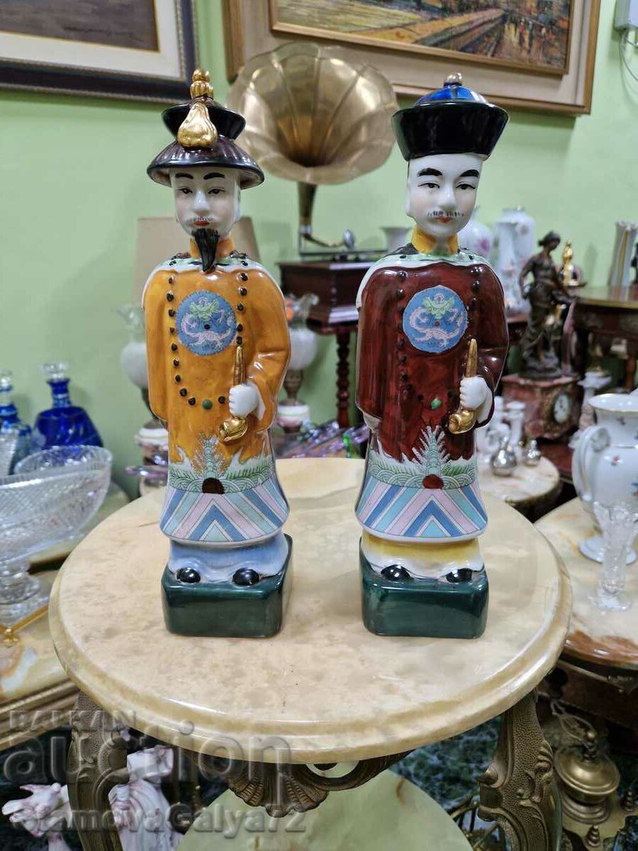 A pair of old Chinese figure figurines