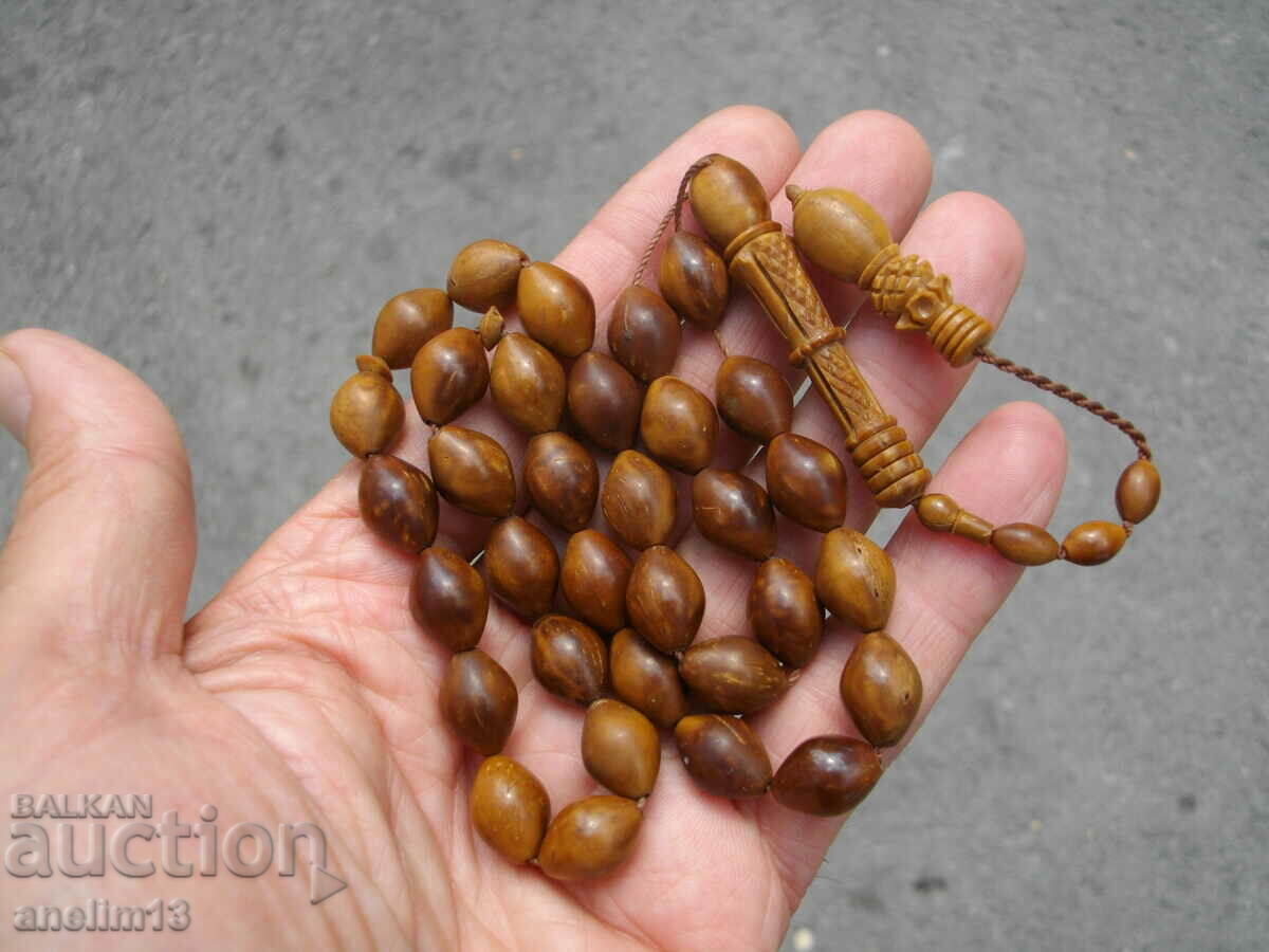 Auction  AN OLD ROSARY OF BONE OR SOME WOOD