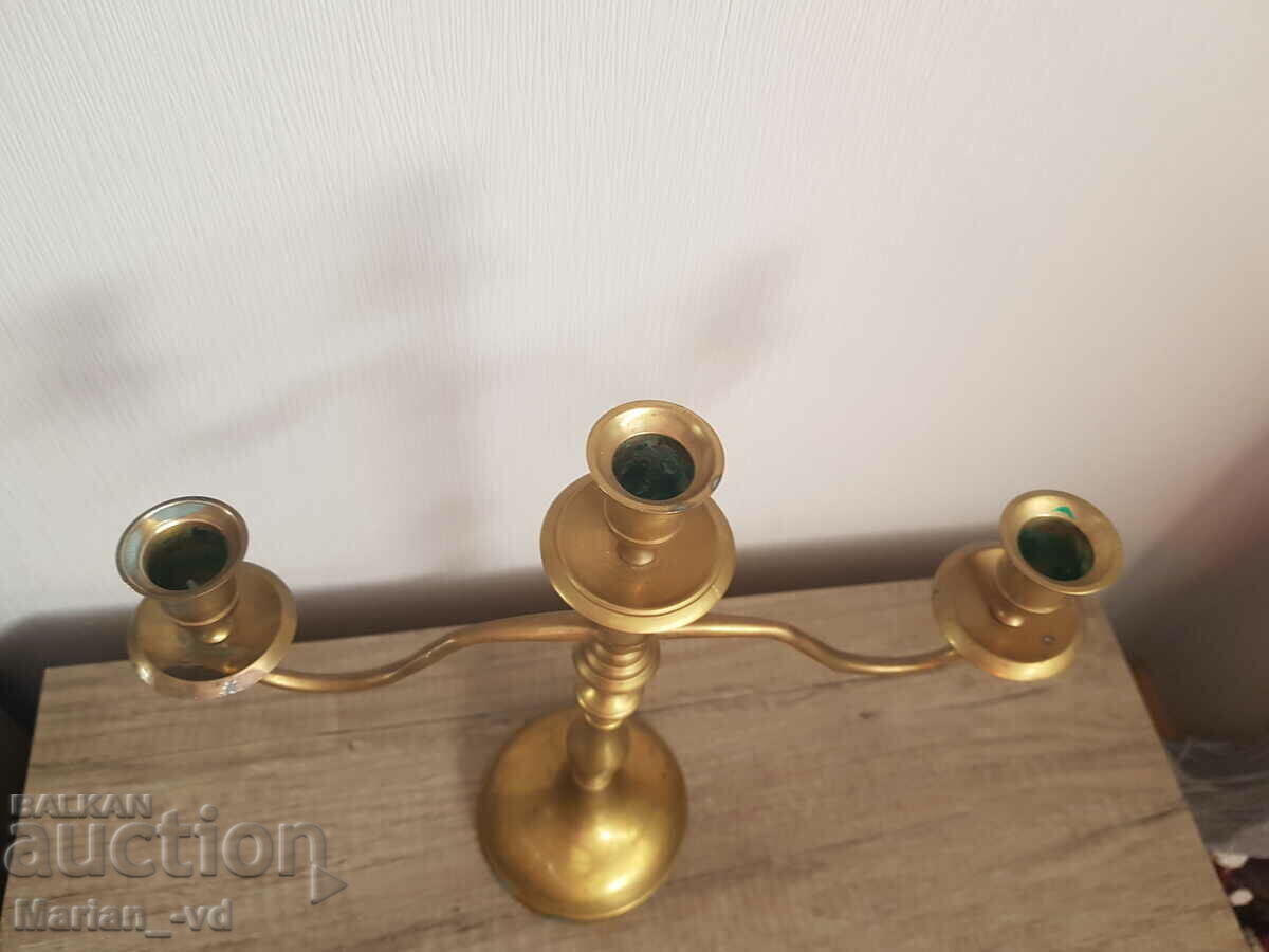 Auction Old bronze candlestick, set of three Auction Old bronze candlestick, set of three