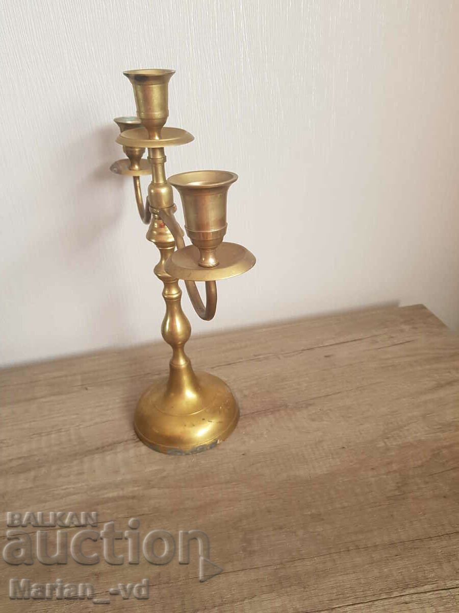 Delivery of Old bronze candlestick, set of three Delivery of Old bronze candlestick, set of three